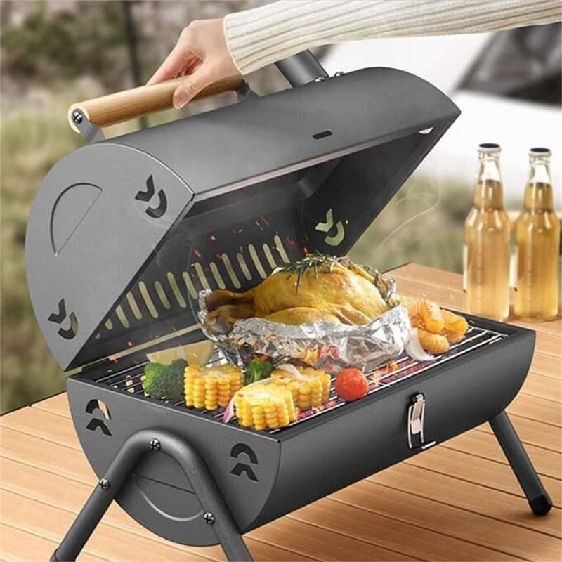 Portable charcoal grill for outdoor cooking